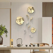 Modern gold-toned metallic wall pendant featuring carp fish and lotus flower design for living room decorbites carp fish decor