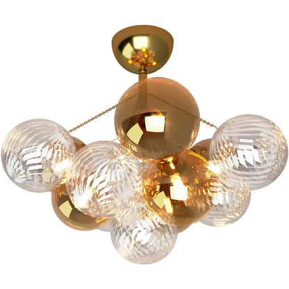 Modern gold cartoon bubble ball chandelier featuring textured clear glass spheres and polished brass mount for kids room decorbites cartoon bubble design