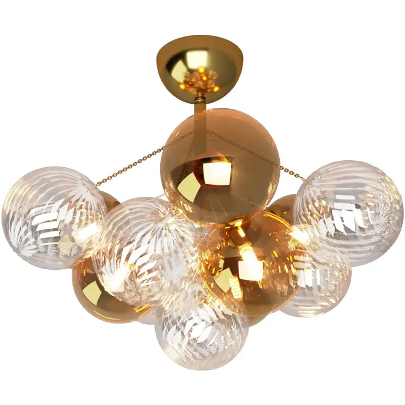 Modern gold cartoon bubble ball chandelier featuring textured clear glass spheres and polished brass mount for kids room decorbites cartoon bubble design