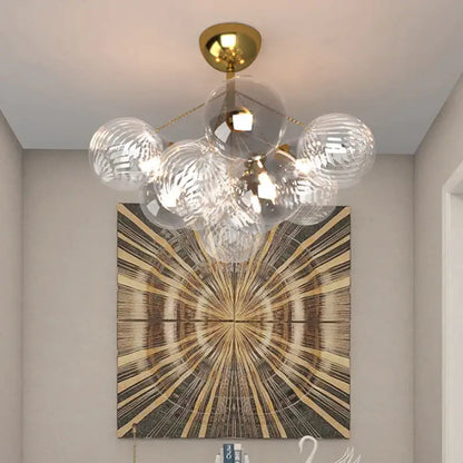 Modern gold cartoon bubble ball chandelier with clear textured glass spheres for kids room decorbites cartoon bubble design