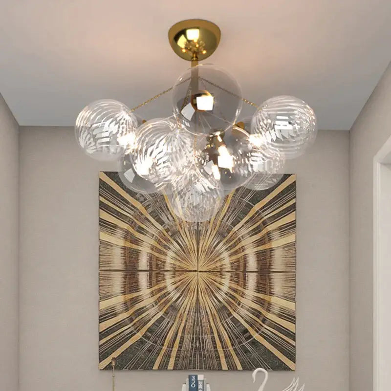 Modern gold cartoon bubble ball chandelier with clear textured glass spheres for kids room decorbites cartoon bubble design