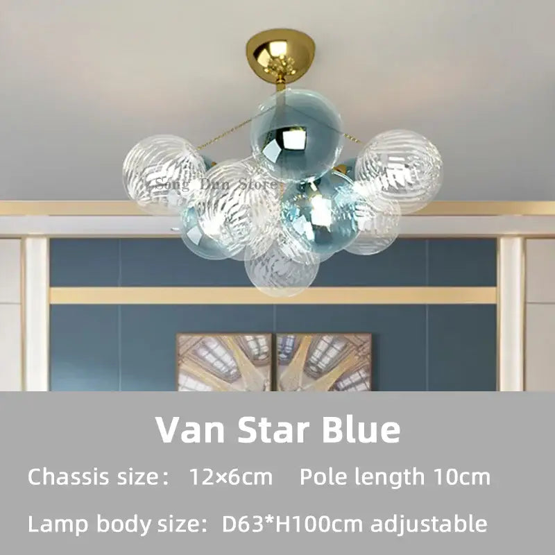 A modern gold decorbites cartoon bubble ball chandelier with translucent blue glass spheres for kids room decor