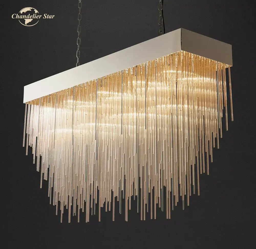 Modern gold cascada rectangular led chandelier with sleek white metal frame and cascading golden glass rods for dining room decorbites cascada rectangular
