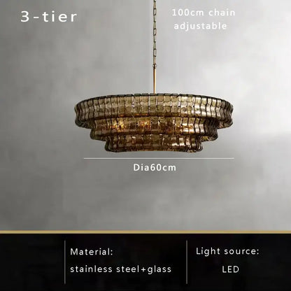 Modern gold cascading crystal pendant lights featuring a three-tiered brown glass pendant with stainless steel frame and adjustable chain