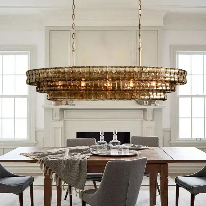 Modern gold cascading crystal pendant lights with gold-toned double-tiered brass chain and brown glass panels decorbites brown glass