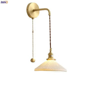 Modern gold ceramic wall lamp with ribbed cream glass shade and twisted brown cord for bedroom decorbites ceramic wall lamp