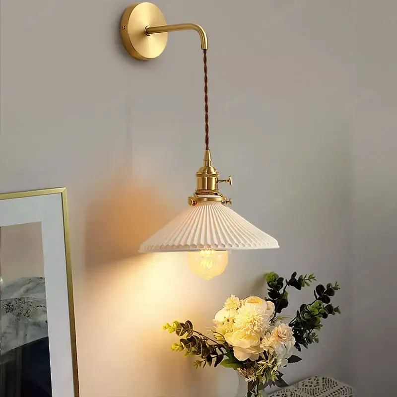 Modern gold ceramic wall lamp with ribbed white shade and twisted brown cord for bedroom decorbites ceramic wall lamp