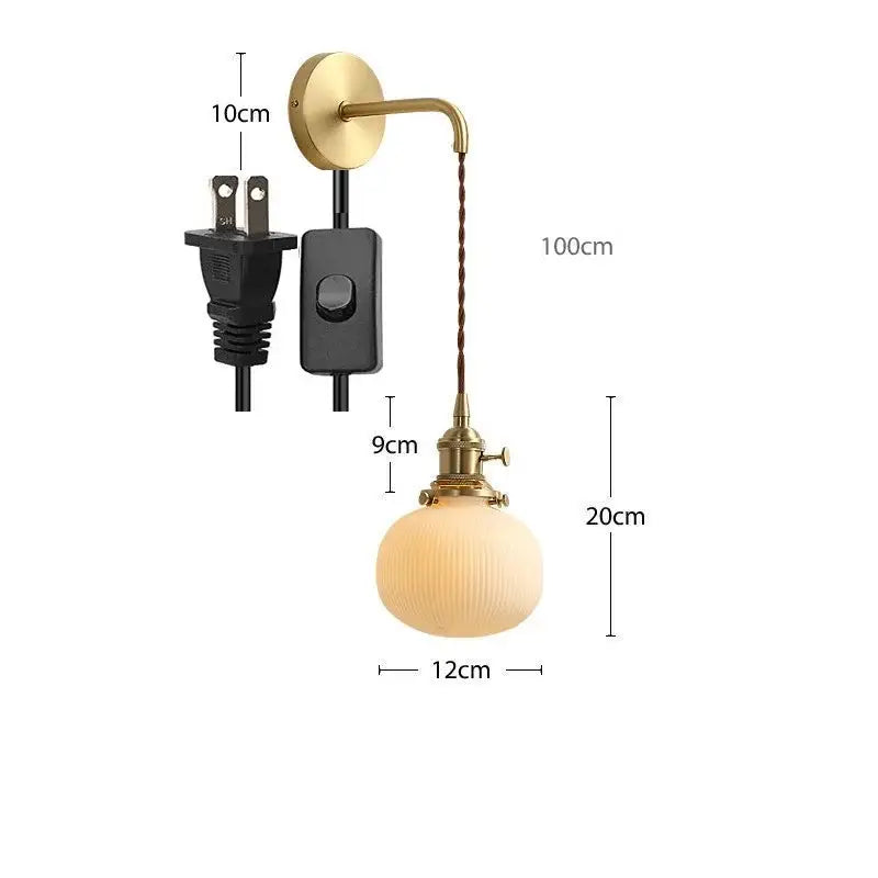 Modern gold ceramic wall lamp with ribbed off-white glass shade and twisted brown cord for bedroom decorbites ceramic wall use