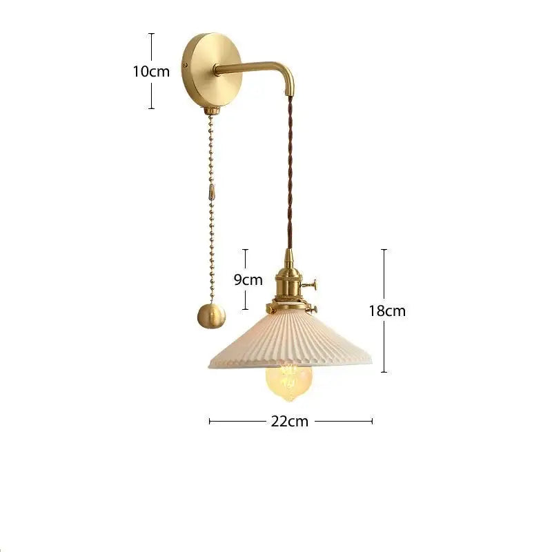 Vintage-style brass wall lamp with fluted off-white glass shade and twisted brown cord from decorbites ceramic wall lamp collection