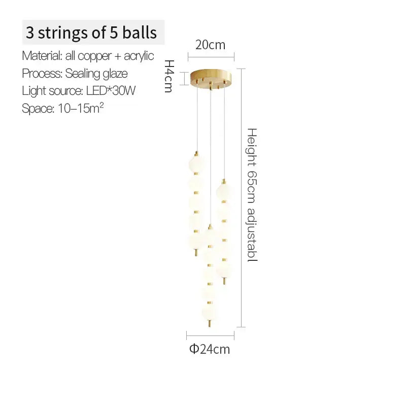 Modern chandelier light fixture with three strings of frosted acrylic balls suspended from a copper base