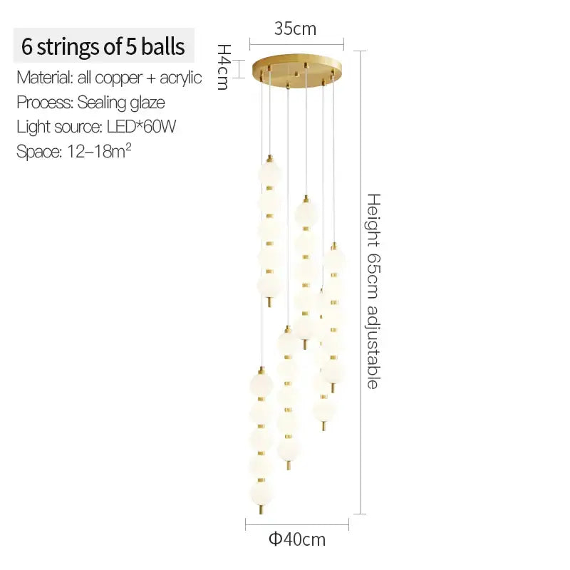 Modern gold copper chandelier light fixture with six strings of frosted glass orbs for living room lighting