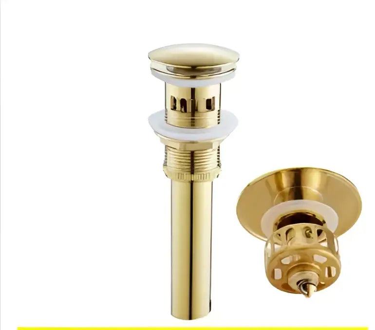 Modern gold and chrome brass basin faucet featuring a gold-toned brass basin faucet drain with decorative perforated cap