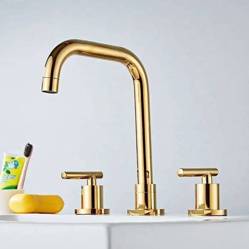 Modern gold and chrome brass basin faucet with sleek curved spout and two handles for kitchen sink use decorbites brass basin faucet