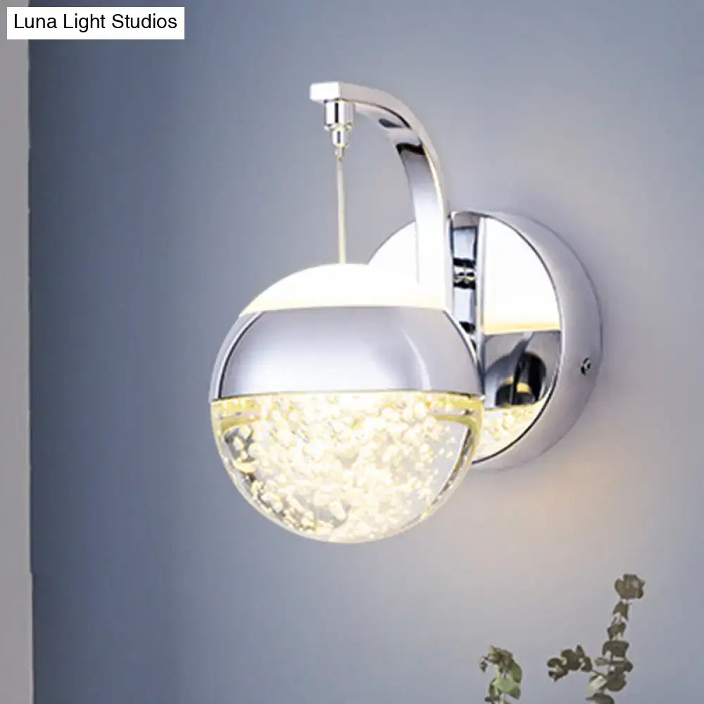 Modern gold chrome crystal ball wall light with chrome finish and translucent sparkling lower half for bedroom lighting