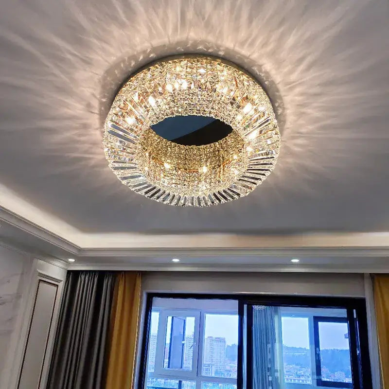 Modern gold and chrome crystal led ceiling light chandelier with radiant light effect for living room decorbites crystal led