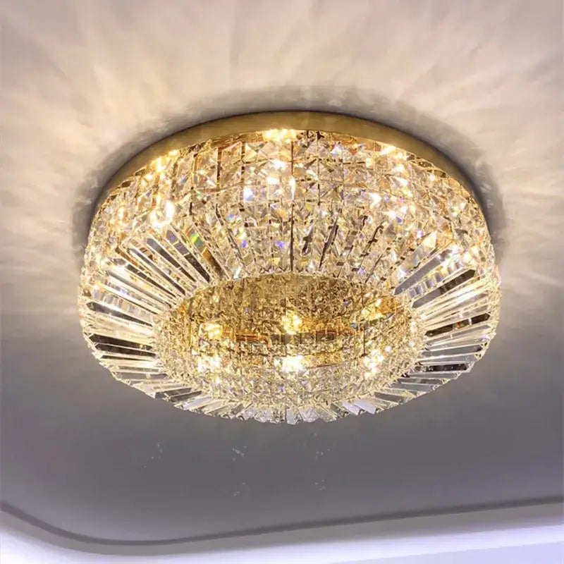 Modern gold and chrome crystal led ceiling lights featuring a circular two-tiered gold frame with faceted crystals