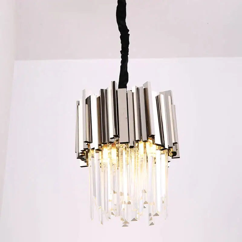 Modern gold and chrome crystal pendant chandelier with vertical metallic bars and hanging glass prisms for dining room decorbites crystal pendant