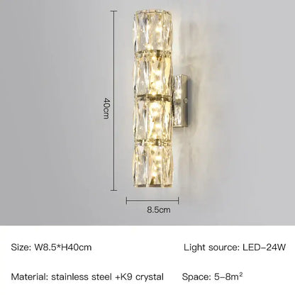 A modern gold and chrome wall lamp with three faceted k9 crystal segments in a stainless steel frame decorbites crystal wall
