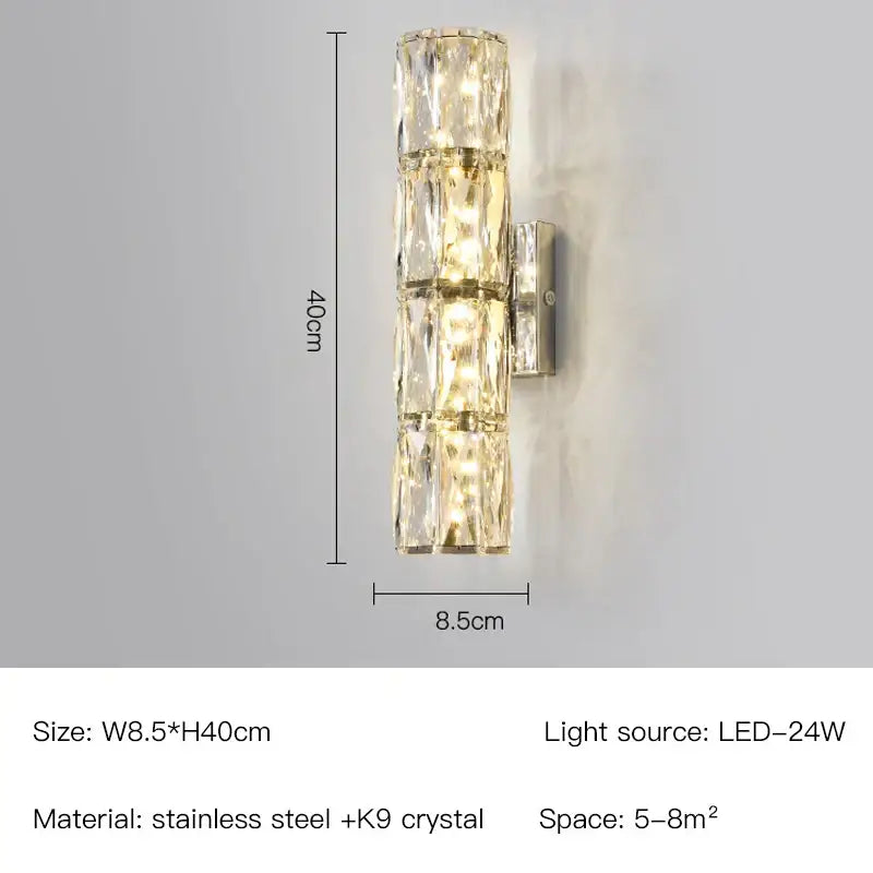 A modern gold and chrome wall lamp with three faceted k9 crystal segments in a stainless steel frame decorbites crystal wall