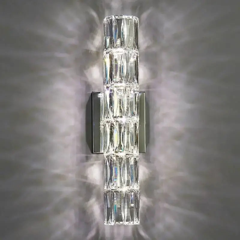 Modern gold and chrome crystal wall lamp with clear faceted crystal and sleek metallic base for elegant decorbites crystal wall decor