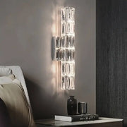 Modern gold and chrome crystal wall lamp with clear faceted geometric crystal design for bedroom decorbites crystal wall
