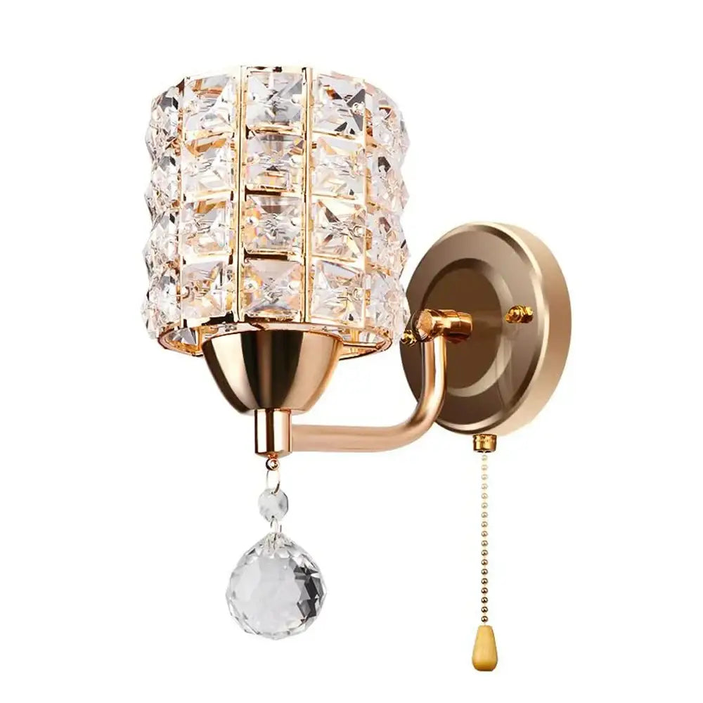 Modern gold wall sconce with cylindrical crystal shade and faceted teardrop decorbites crystal wall light