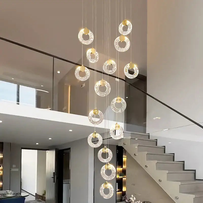 Modern gold circular crystal led chandelier with multiple hanging crystal lights and gold-toned decorbites circular crystal accents