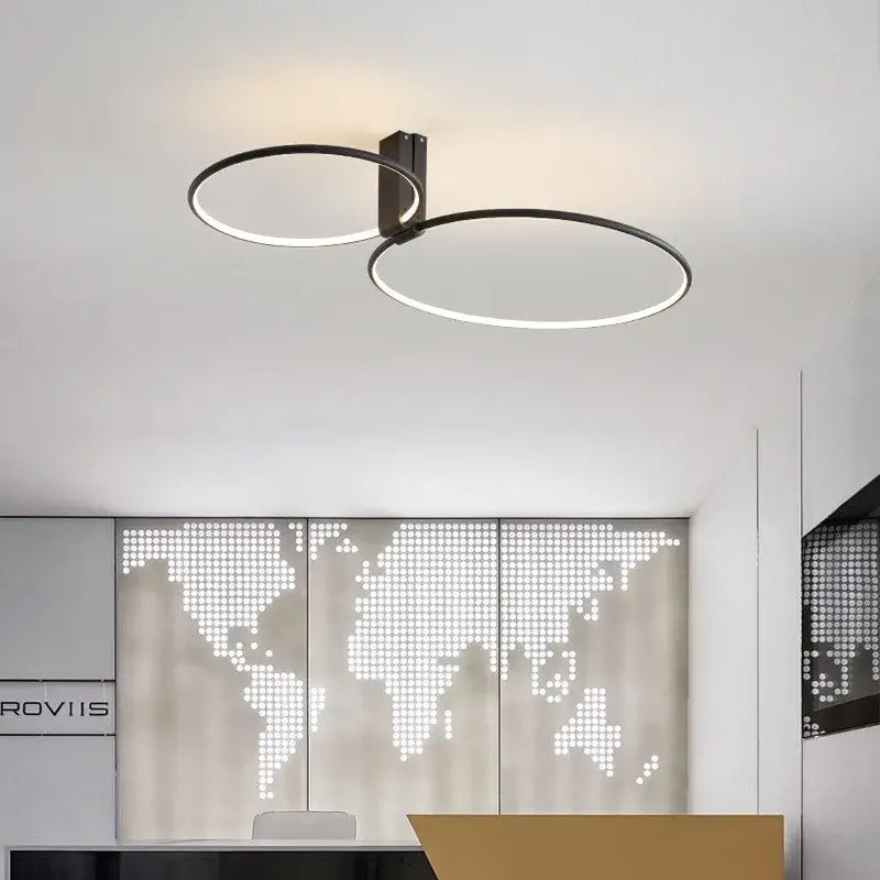 Modern black circular led ceiling light with intersecting rings and metallic bracket for decorbites circular led ceiling use
