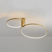 Modern gold circular led ceiling light with two interlocking rings and 360 degree rotation by decorbites circular led
