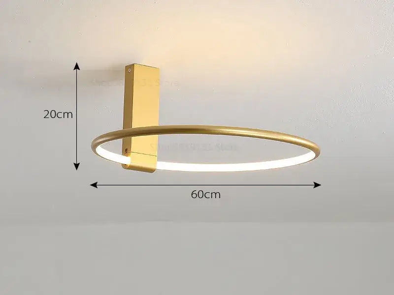 Modern gold circular led ceiling light with sleek illuminated ring and 360 degree rotation for bedroom decorbites circular led