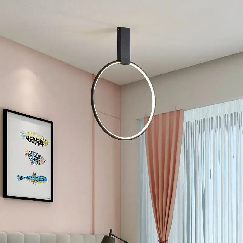 Modern gold circular led ceiling light with sleek black rectangular mount and thin illuminated metallic ring for bedroom decorbites circular led