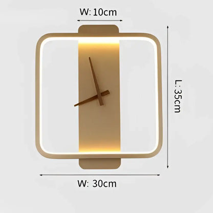 Modern gold circular led wall lamp wall clock with gold-toned frame, glowing led strip, and minimalist brown hands on white face