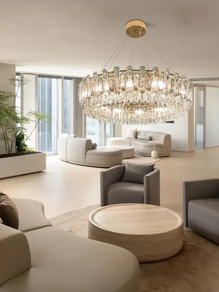 Modern gold clear crystal oval chandelier with cascading crystal droplets for elegant dining room decorbites clear crystal light