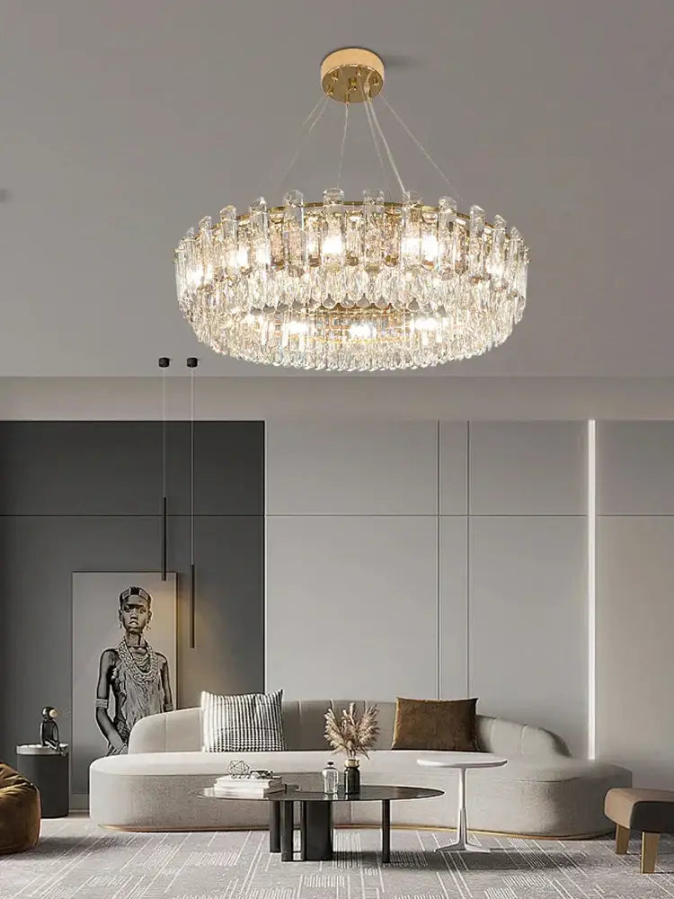 Modern gold clear crystal oval chandelier with multi-tiered design and hanging chains for dining room decorbites clear crystal