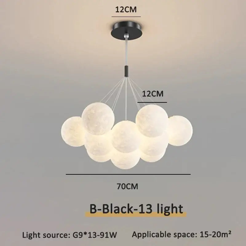 Modern gold cloud bubble ball led pendant lights feature frosted white bulbs and a black ceiling mount for dining room decor