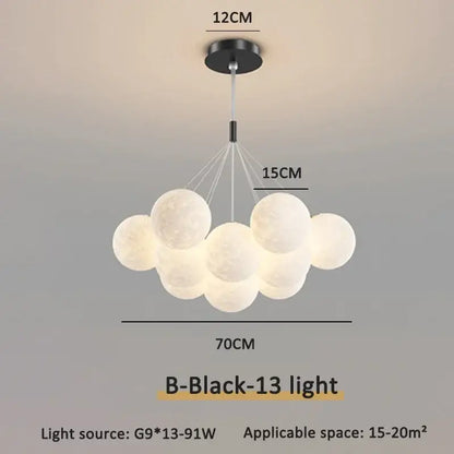 Modern gold decorbites bubble ball led pendant light in white with black ceiling mount for dining room decor
