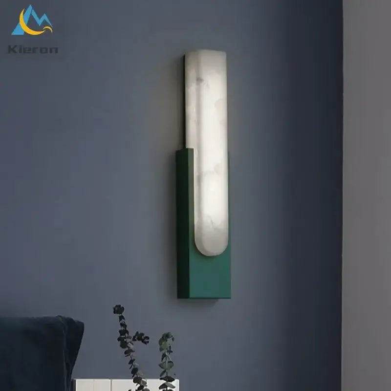 Modern gold cloud stone led wall light with a matte green metal frame and white marble-like diffuser for elegant wall light decorbites cloud stone