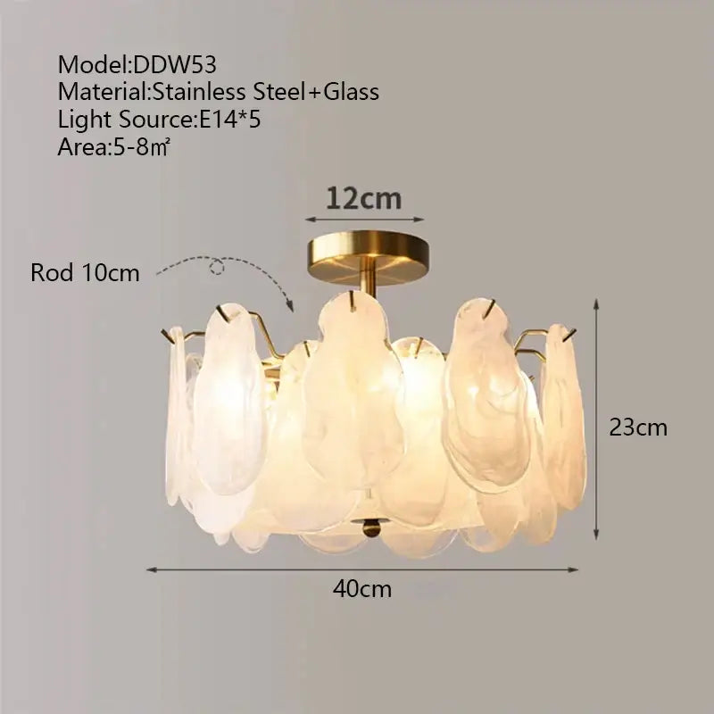 Modern gold cloudy glass chandeliers with brushed brass finish and translucent leaf-shaped glass shades for living room lighting