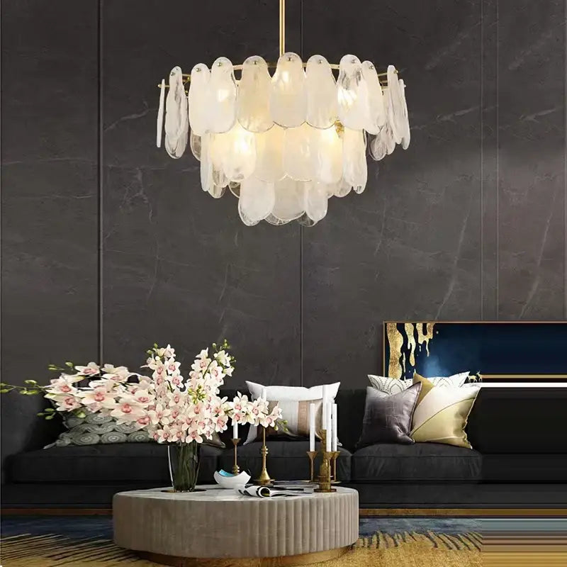 A modern gold cloudy glass chandelier with translucent layered glass shells for living room lighting decorbites cloudy glass
