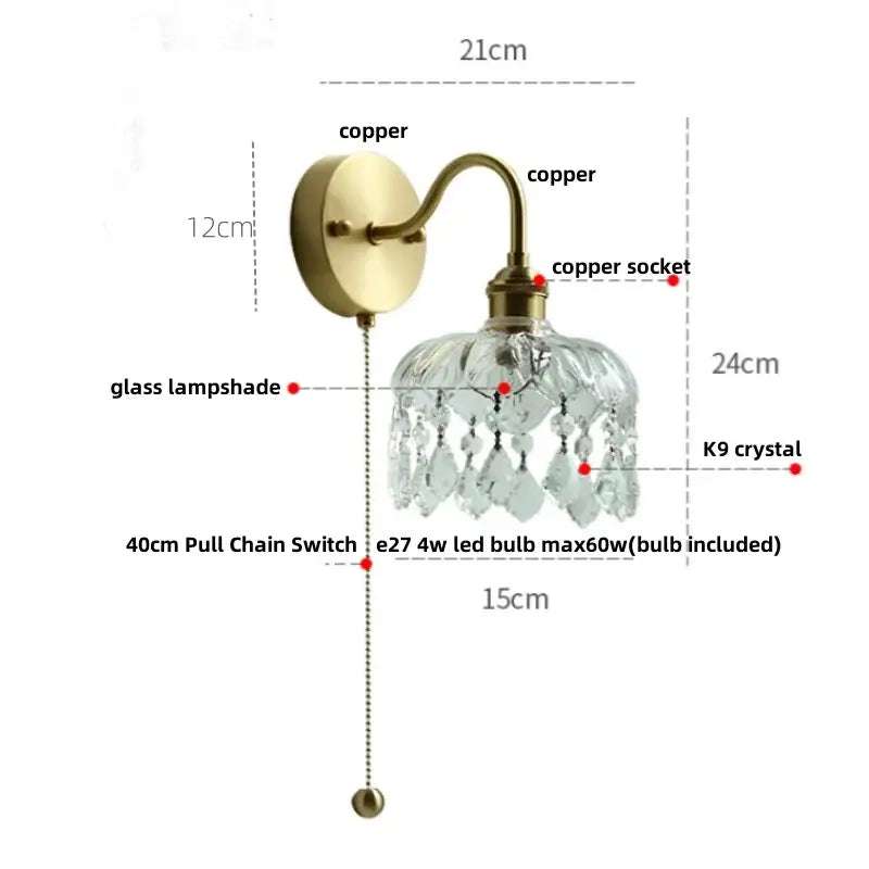 Modern gold conch shell wall light fixture with antique brass finish clear glass shade and dangling k9 crystal droplets