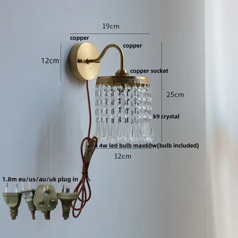 Modern gold conch shell wall light fixture with brass-finished copper and cascading k9 crystal droplets for bedroom use