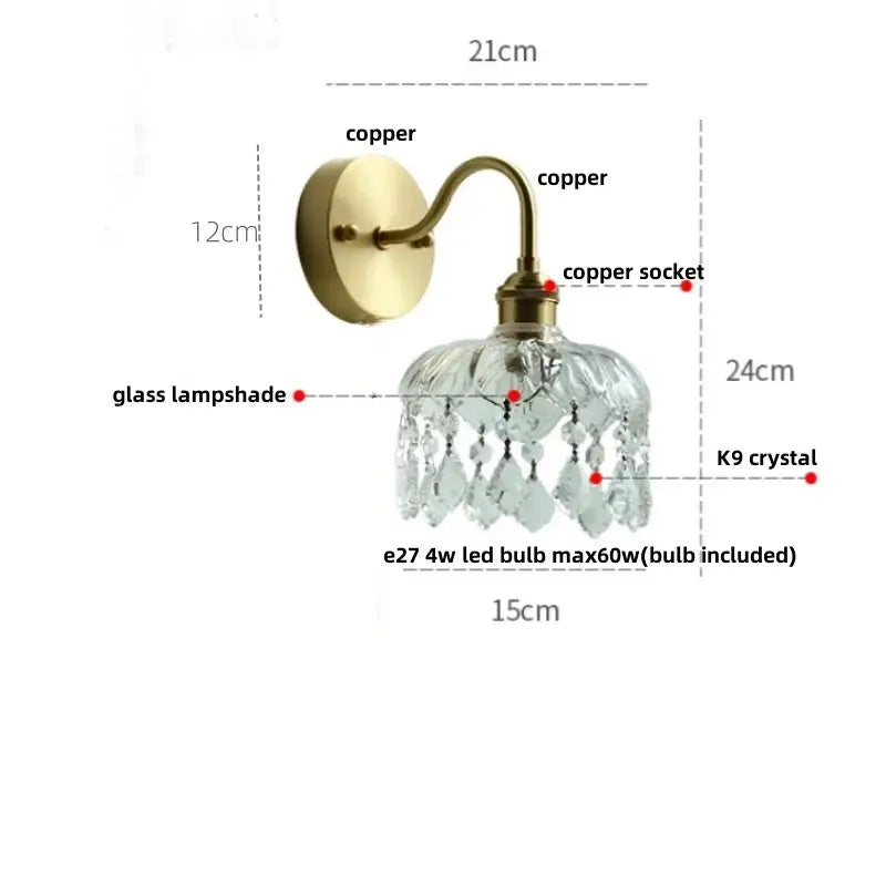 Modern gold conch shell wall light fixture with brass-finished copper, faceted glass lampshade, and k9 crystal droplets