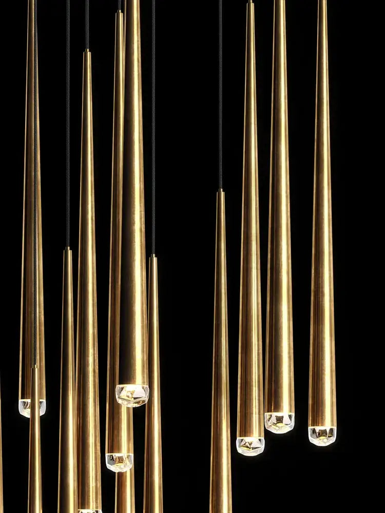 Modern gold conical led nordic chandelier with golden brass pendant lights and crystal accents hanging from black cords
