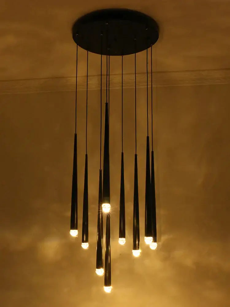 Black modern pendant chandelier with slender tapered rods and warm glowing lights for decorbites conical led nordic decor