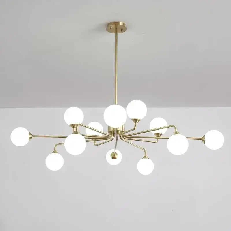 Modern gold copper ceiling chandelier with frosted glass globe bulbs in a branching design by decorbites copper ceiling
