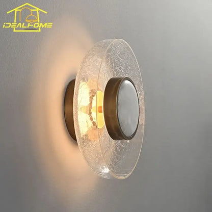 Modern gold wall lamp with crackled clear glass shade and bronze metal base decorbites cracked glass bedroom sconce