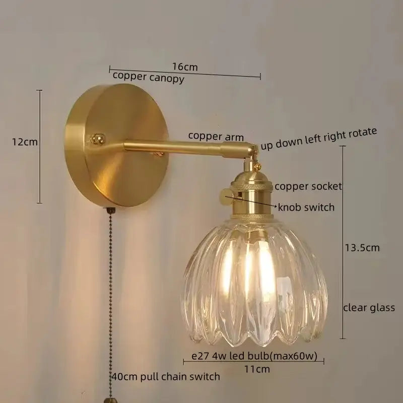 Brass-finished copper wall light with clear ribbed glass shade and adjustable arm for decorbites led wall lights