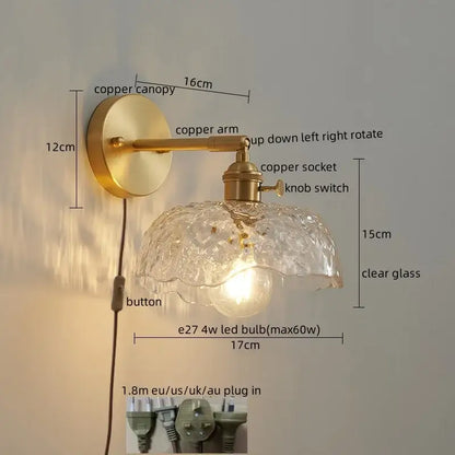 A vintage-style led wall light with brass-finished copper arm and ornate crackled glass shade for bedroom decorbites wall lights