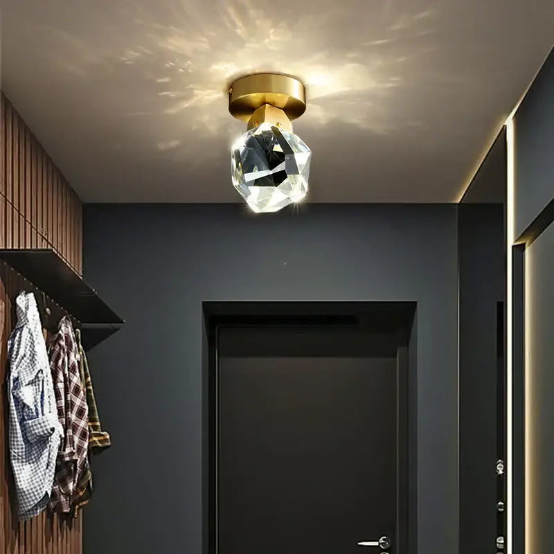 A faceted crystal aisle ceiling light with gold-toned ceiling mount for modern entryway decorbites ceiling light