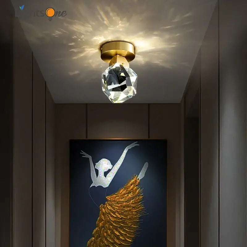 Modern gold crystal aisle ceiling light featuring a faceted crystal globe ideal for entryway decorbites ceiling light